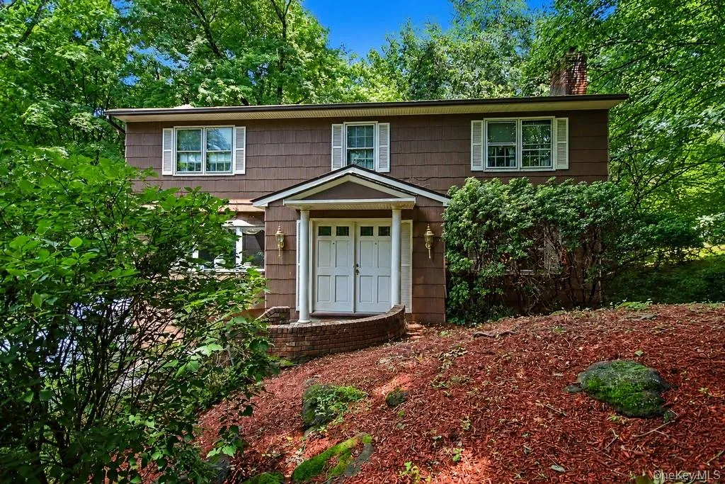Classic Colonial offering privacy and peaceful surroundings Classic Colonial offering privacy and peaceful surroundings