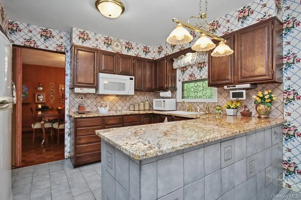 Kitchen has granite counters Kitchen has granite counters