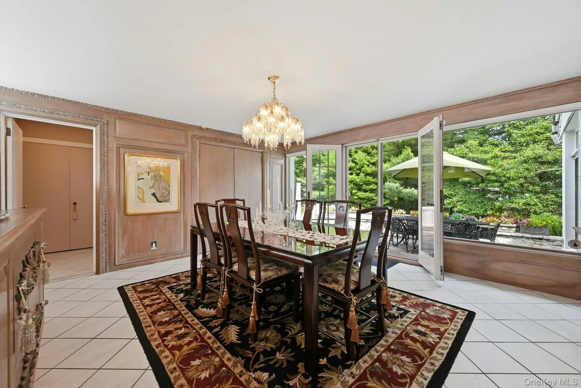 Formal Dining Room with Custom Panels, Built ins and French Doors to Patio Formal Dining Room with Custom Panels, Built ins and French Doors to Patio