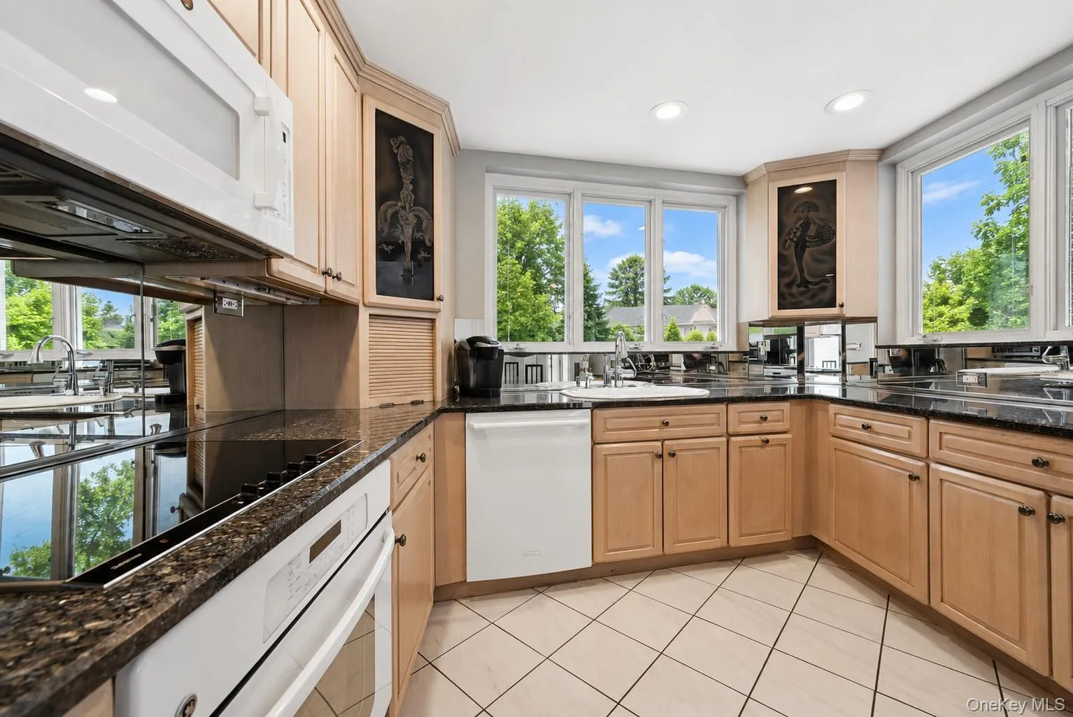 Kitchen with Custom Wood Cabinetry and Granite Counters Kitchen with Custom Wood Cabinetry and Granite Counters