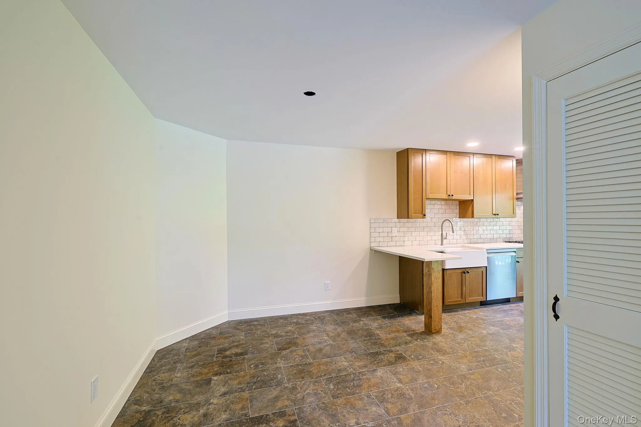 Ample dining space with custom built storage closet Ample dining space with custom built storage closet