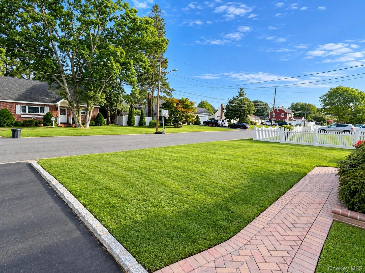 Wide & Quiet Street with "elbow" room. Brick paver sidewalk to front porch sitting area. Wide & Quiet Street with "elbow" room. Brick paver sidewalk to front porch sitting area.