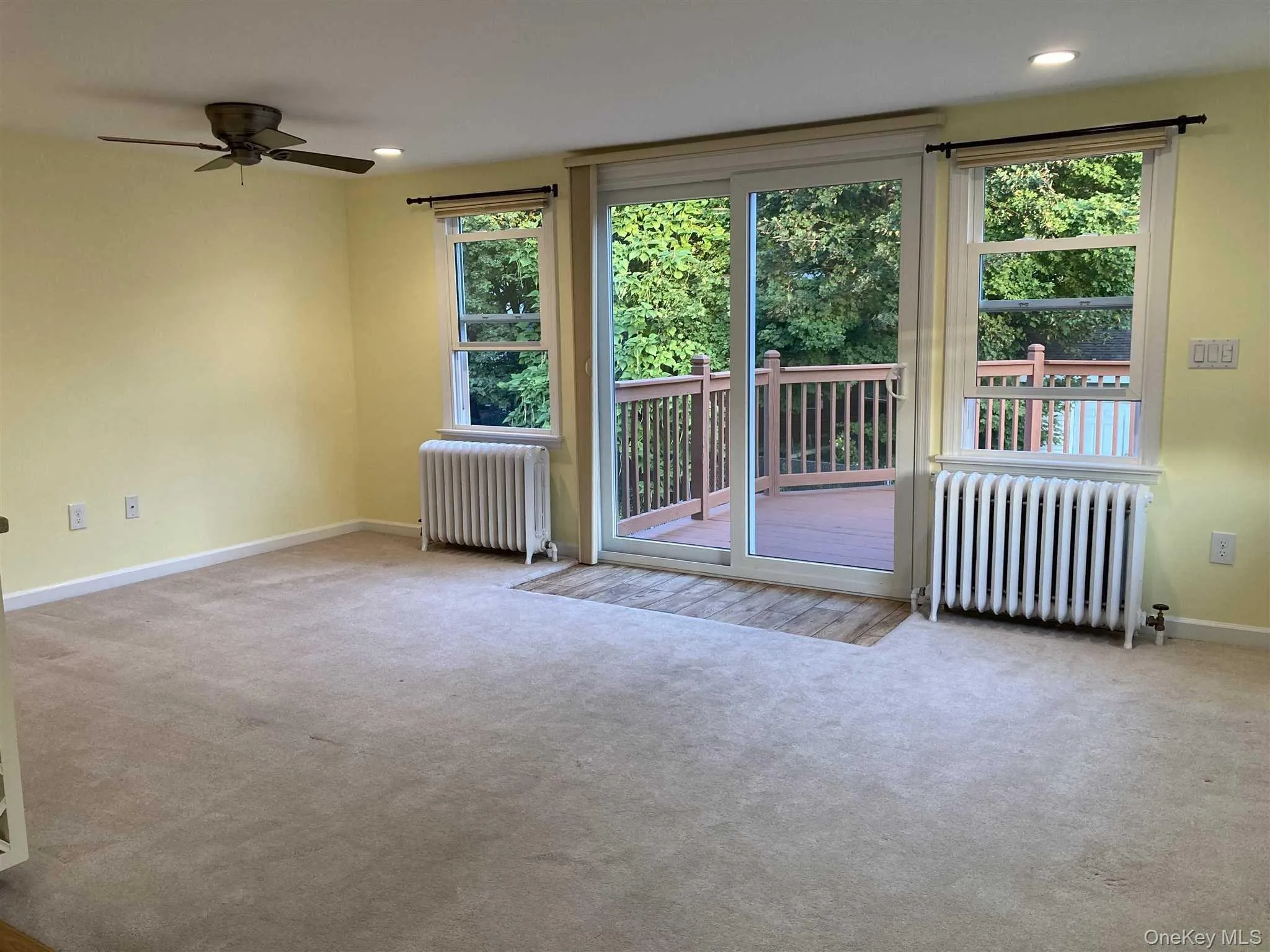 Family room with slider to deck Family room with slider to deck