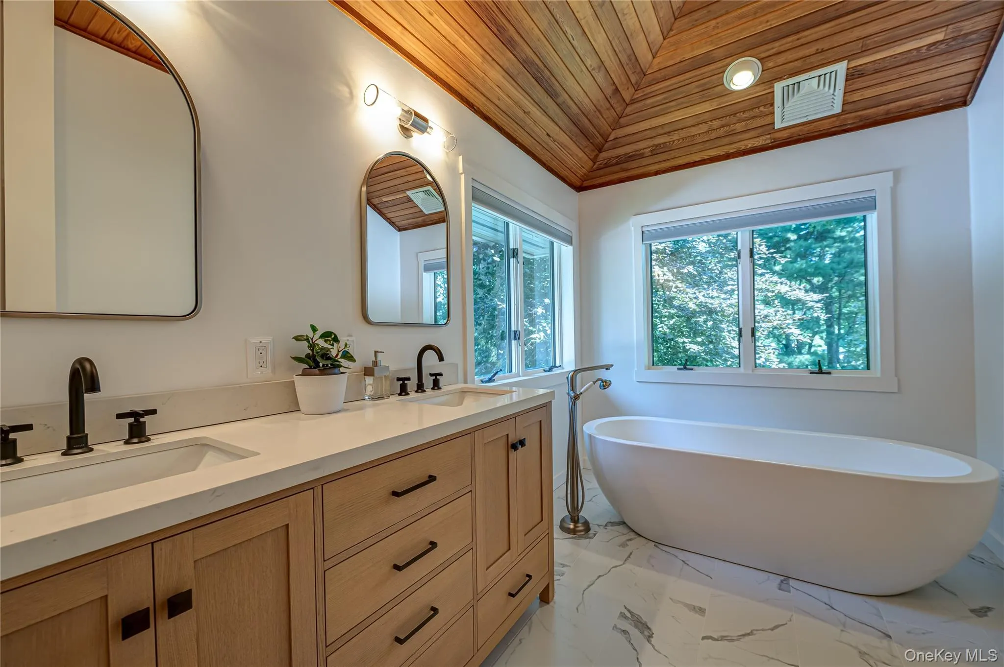 Brand new Master Bathroom with double sinks, shower and free standing tub. Brand new Master Bathroom with double sinks, shower and free standing tub.