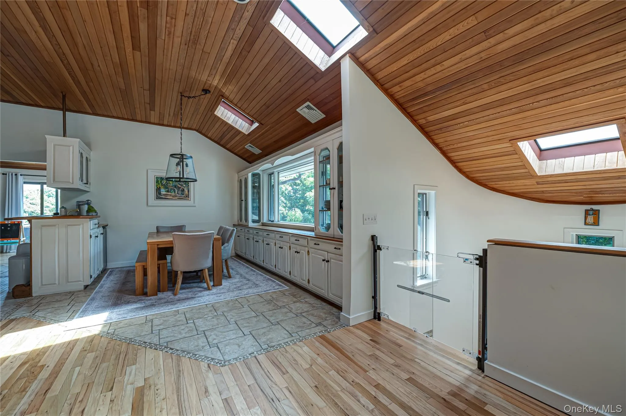 Dinning Room with Tile & Natural wood flooring, Built in's and Skylights Dinning Room with Tile & Natural wood flooring, Built in's and Skylights