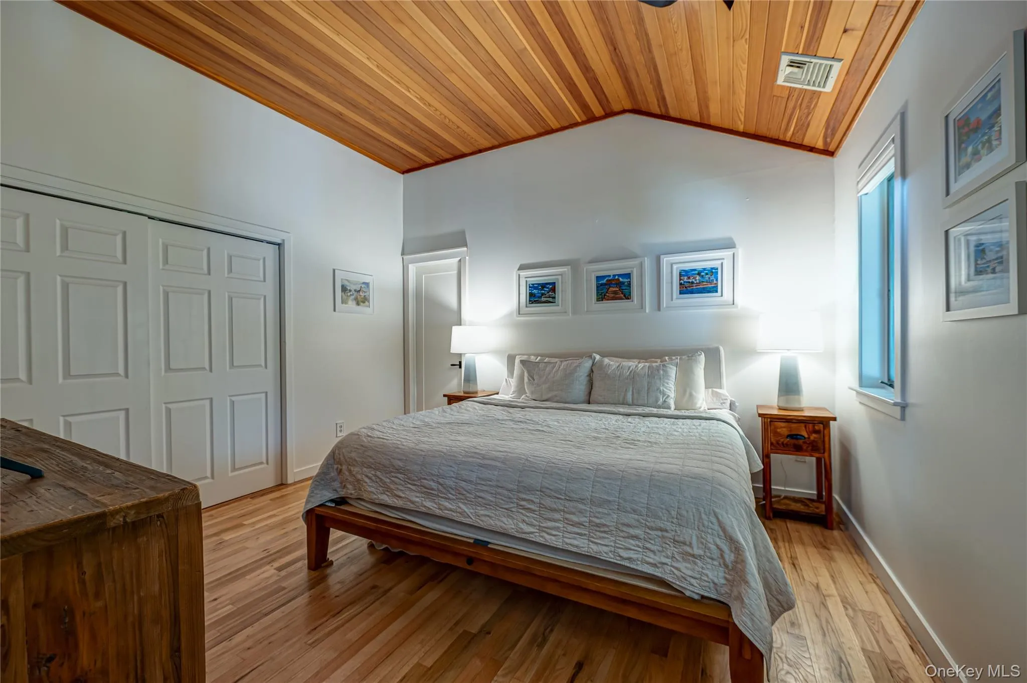 Master Bedroom with natural wood flooring, skylights & storage. Master Bedroom with natural wood flooring, skylights & storage.