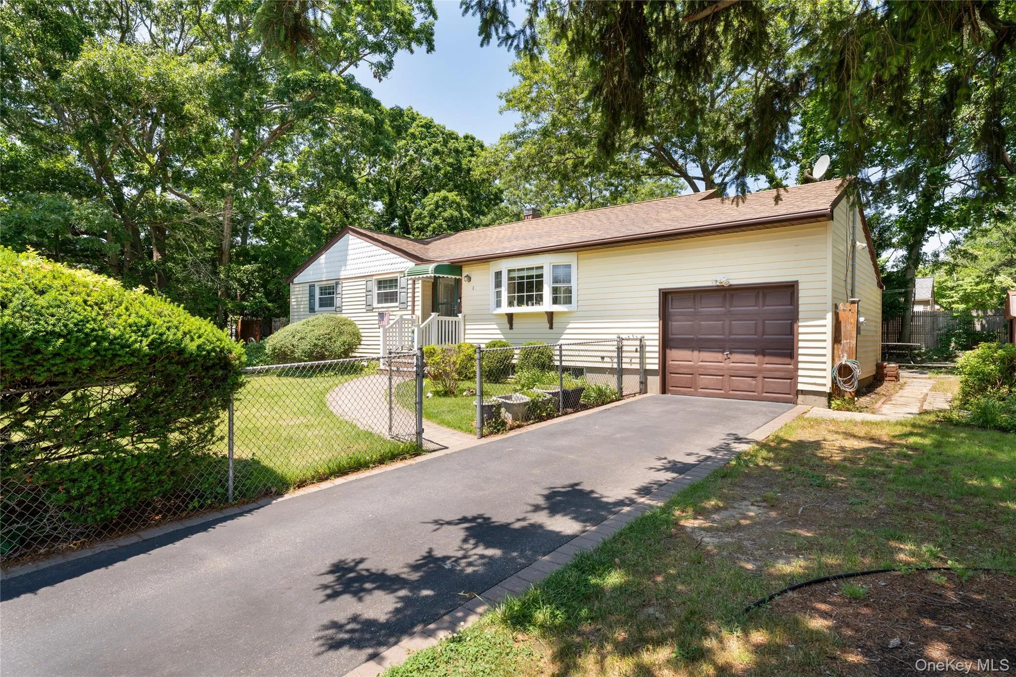 1 car garage with storage and door to back yard 1 car garage with storage and door to back yard