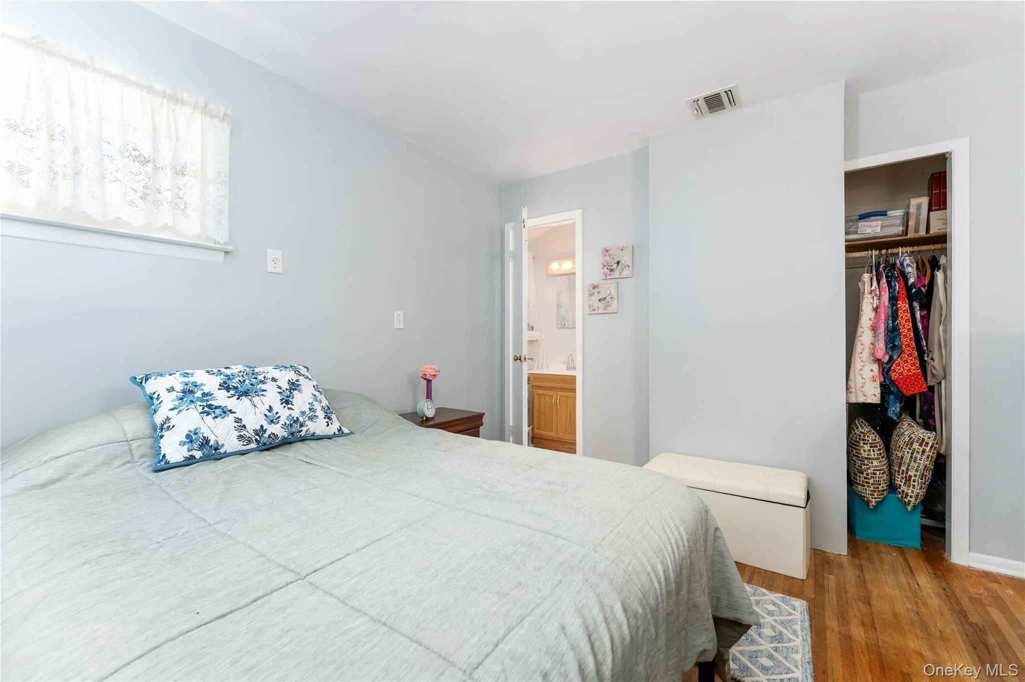View of bathroom/closet, hardwood floors View of bathroom/closet, hardwood floors