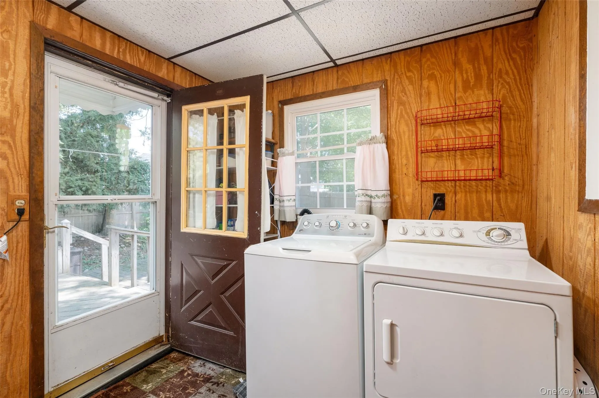 Laundry on main level, door to back deck, extra refridgerator Laundry on main level, door to back deck, extra refridgerator