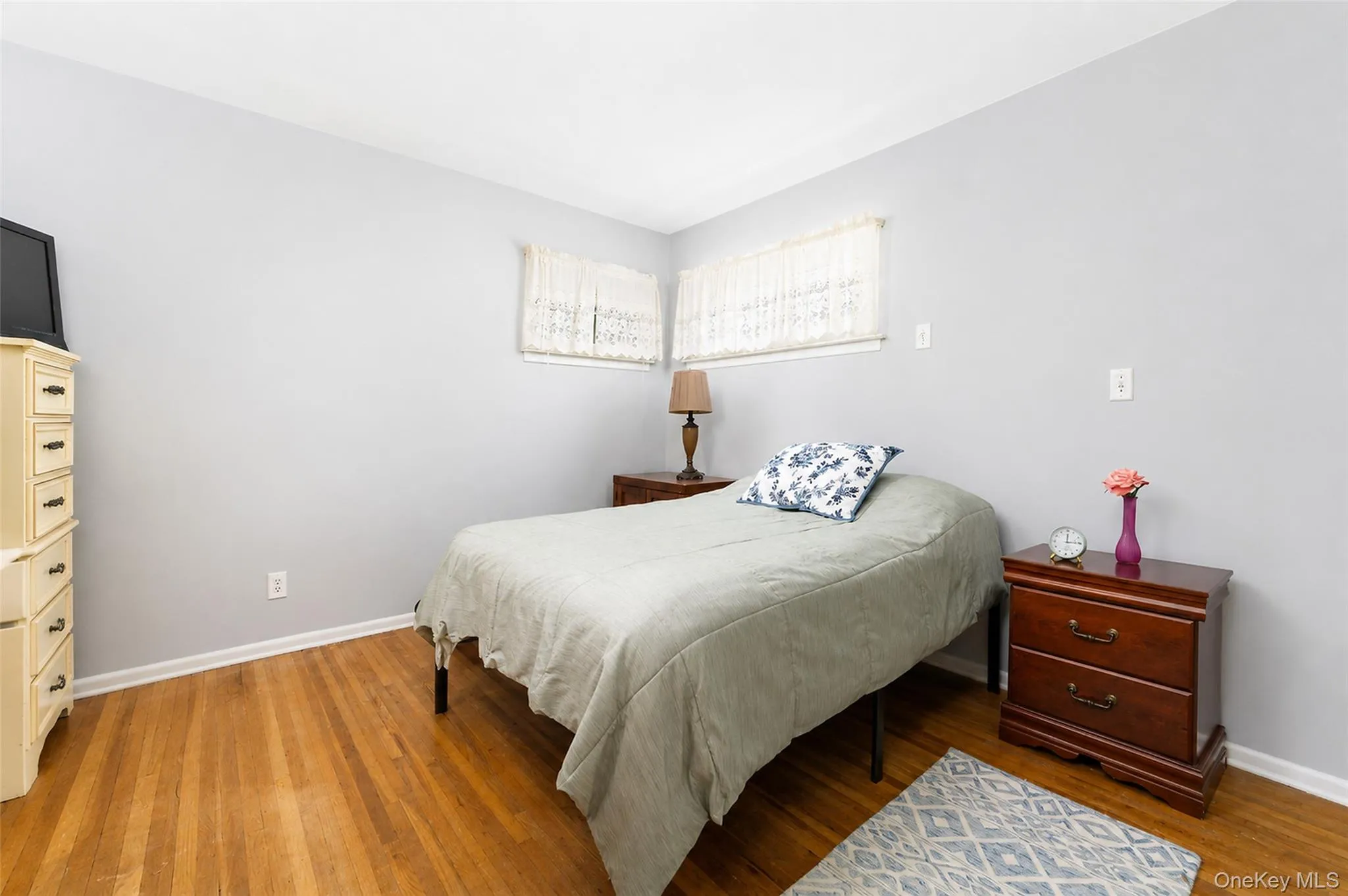 Spacious primary suite with full bathroom, hardwood floors Spacious primary suite with full bathroom, hardwood floors