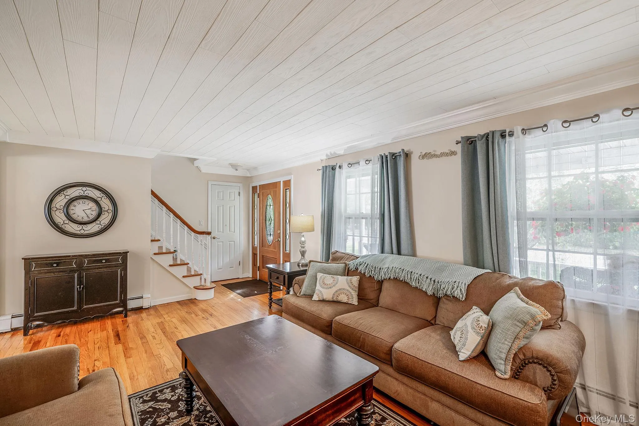 Living room with hardwood flooring. Living room with hardwood flooring.