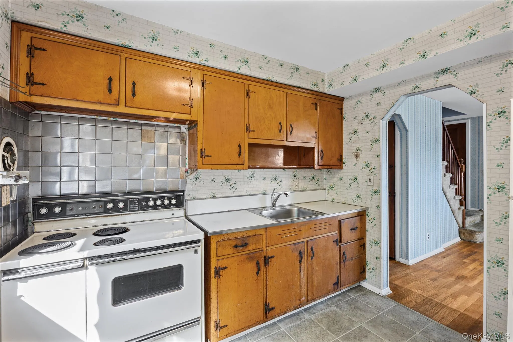 Original kitchen in need of a renovation. Look on at a beautifully renovated rendering. Original kitchen in need of a renovation. Look on at a beautifully renovated rendering.