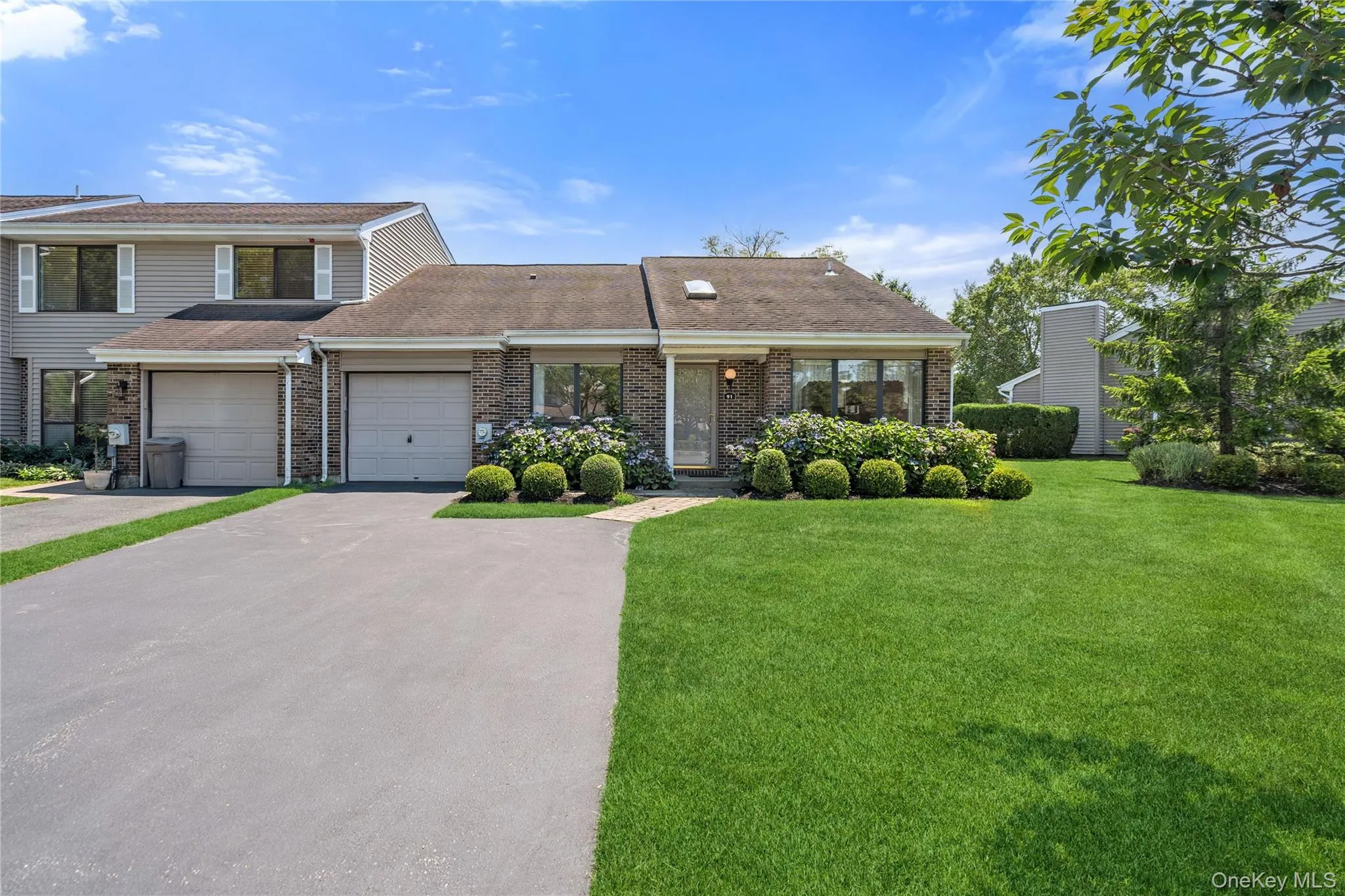 Ranch style End Unit With Expanded Driveway and 1 Car Garage Ranch style End Unit With Expanded Driveway and 1 Car Garage