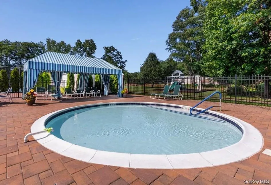 Kiddie Pool with white coping and blue tile detailing Kiddie Pool with white coping and blue tile detailing
