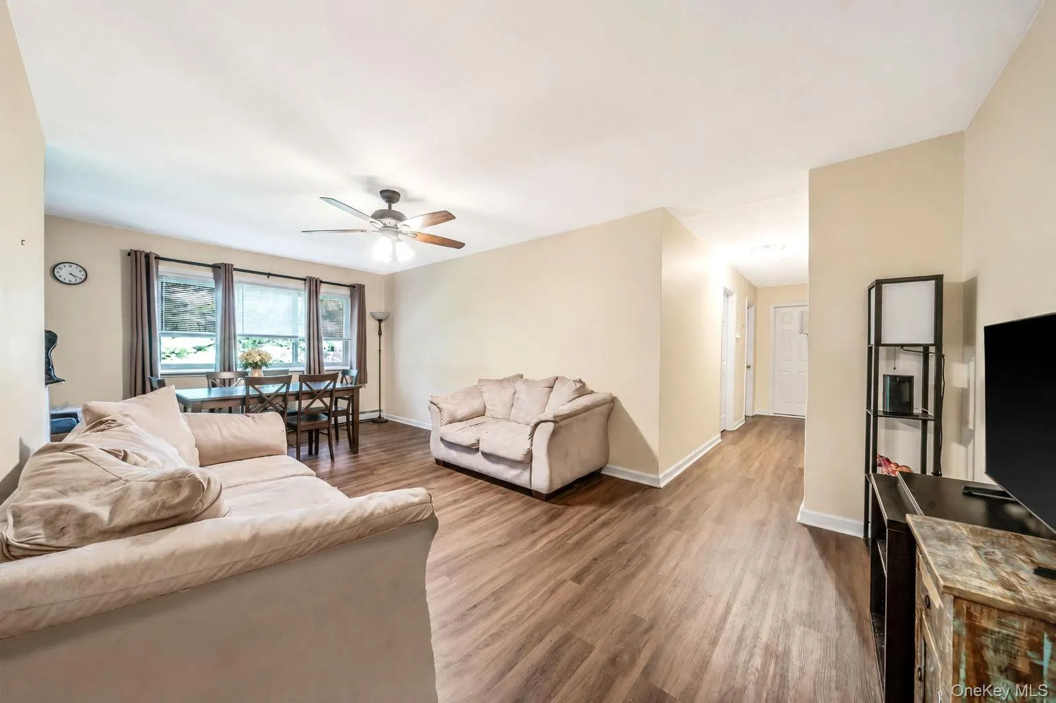 Spacious LR with Lifeproof Flooring, Ceiling Fan, Open Flow to Dining Area and Entrance Foyer Spacious LR with Lifeproof Flooring, Ceiling Fan, Open Flow to Dining Area and Entrance Foyer