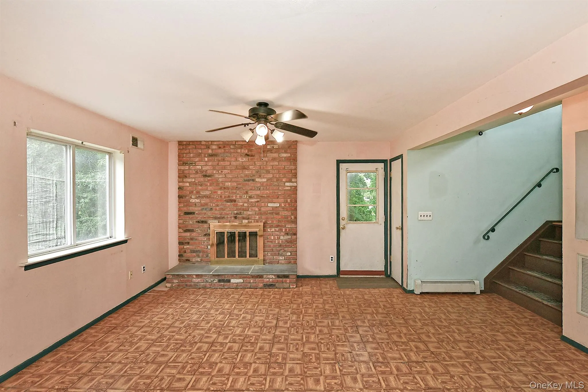 Family Room With Fireplacee and Entrance Family Room With Fireplacee and Entrance