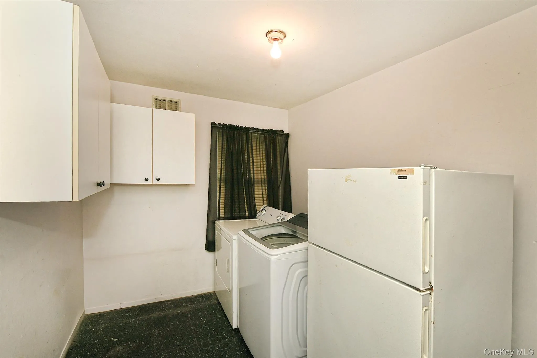 Spacious Laundry Room On Main Level Spacious Laundry Room On Main Level