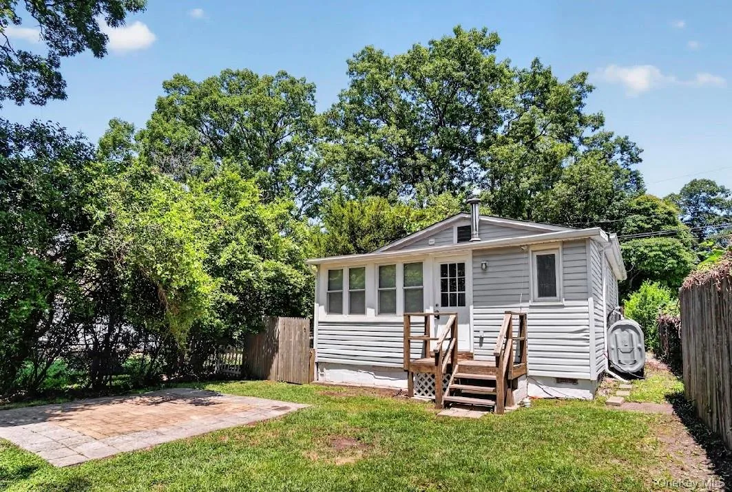Back of house, patio. Back of house, patio.