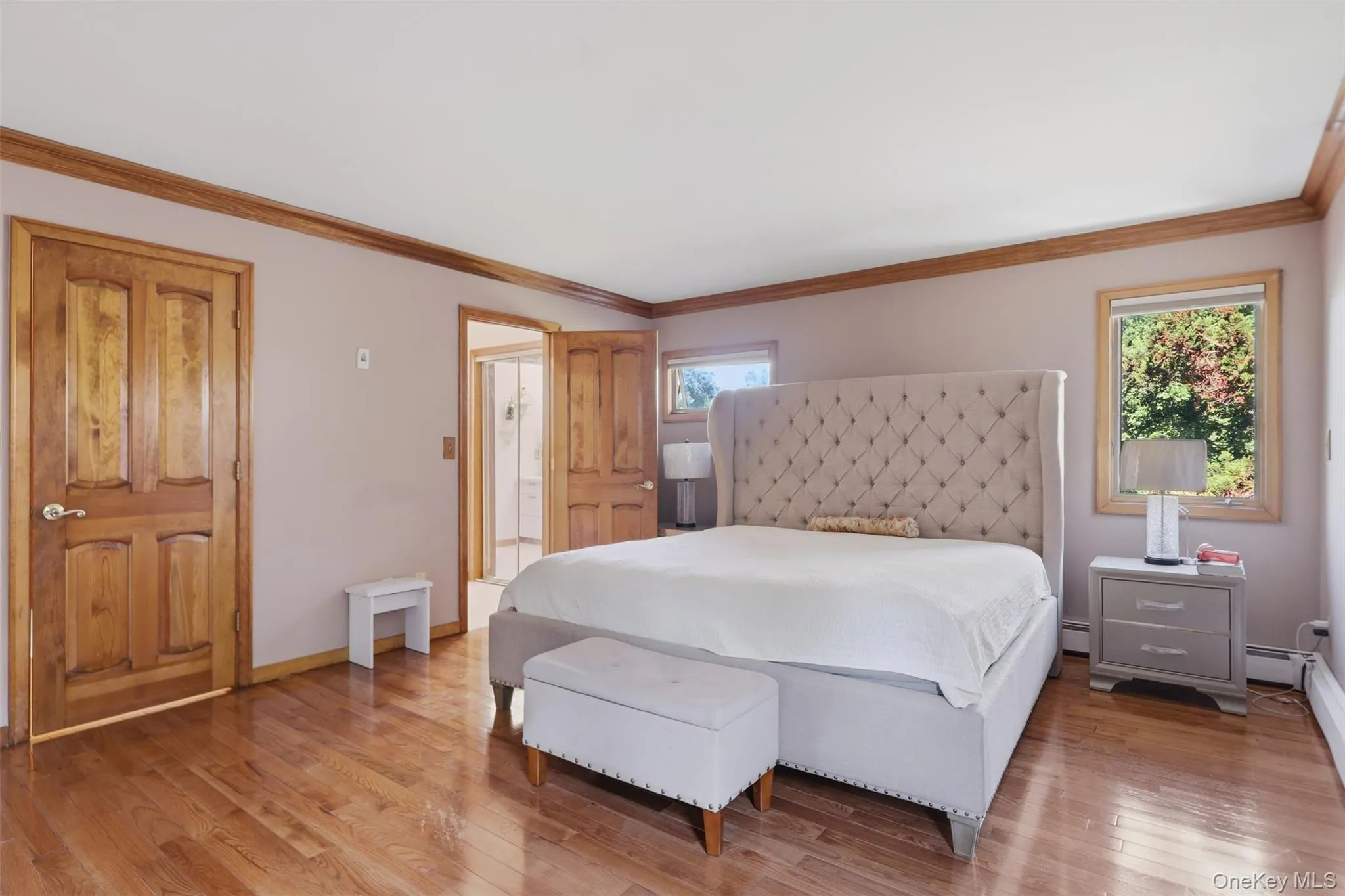 Hardwood flooring with natural wood trim and doors Hardwood flooring with natural wood trim and doors