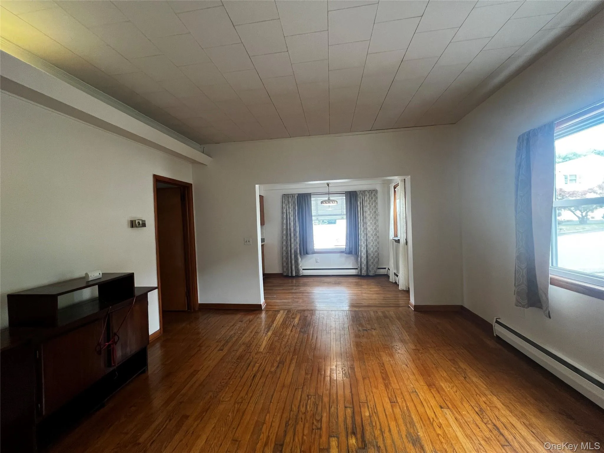 Living room layout off dining area. Living room layout off dining area.