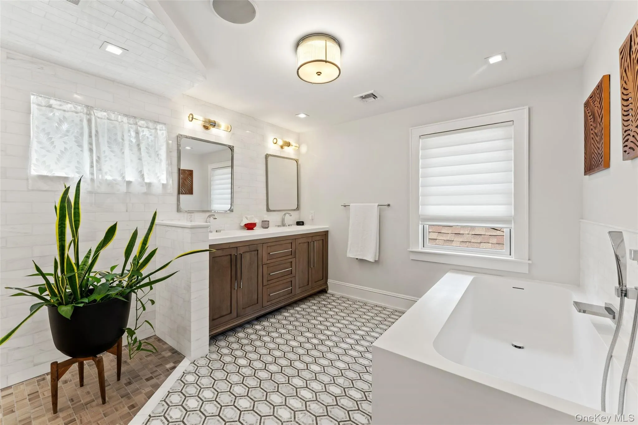 Luxe 2nd floor bath with double vanity, huge walk in rain shower, soaking tub, and radiant heated flooring. Luxe 2nd floor bath with double vanity, huge walk in rain shower, soaking tub, and radiant heated flooring.