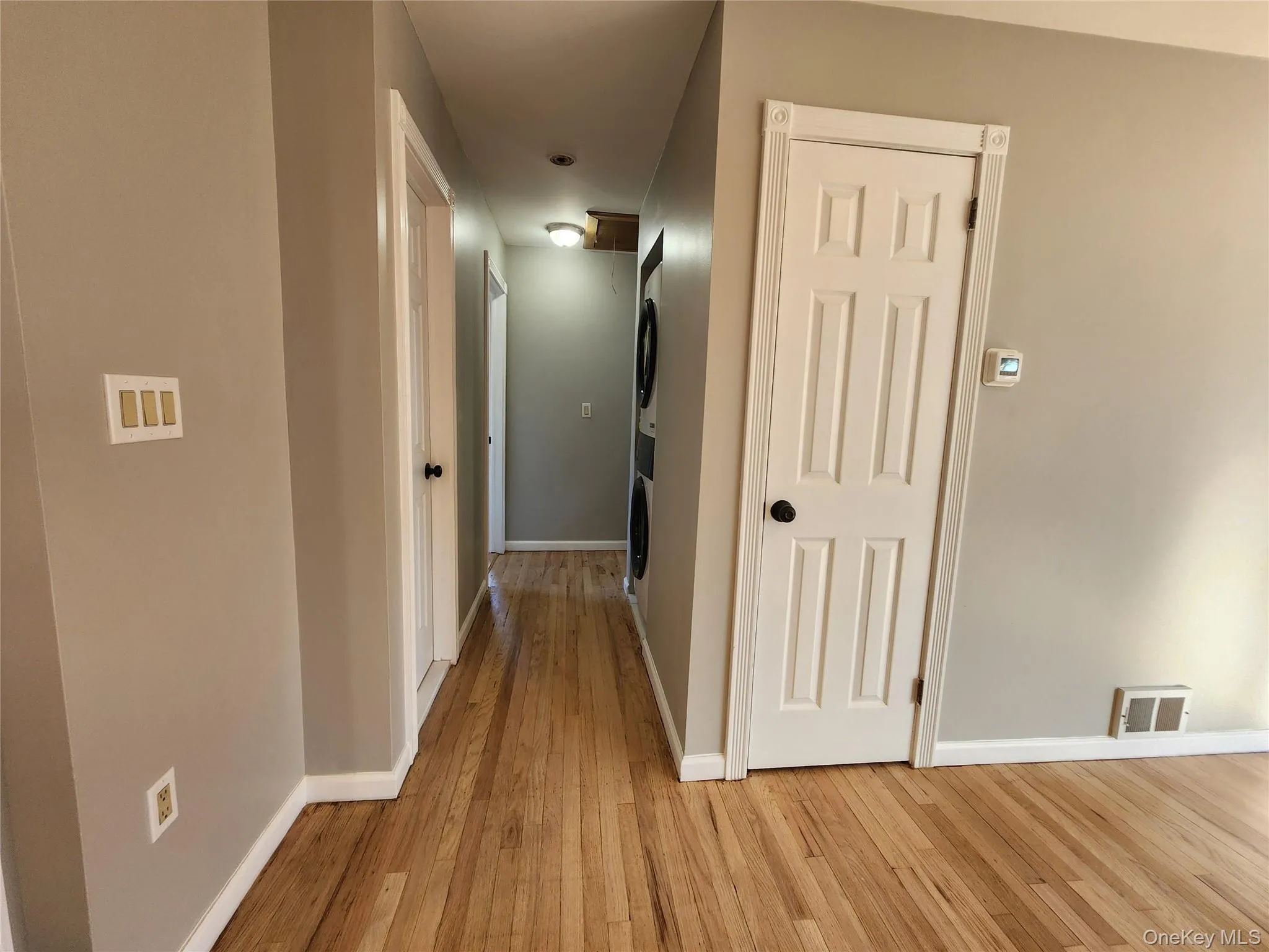 Hallway leading to bathroom, bedrooms and Laundry area Hallway leading to bathroom, bedrooms and Laundry area