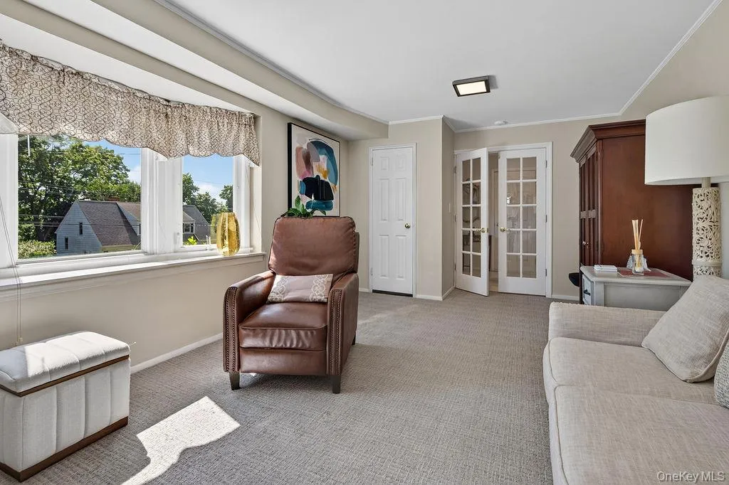 another view of family room with beautiful bay window another view of family room with beautiful bay window