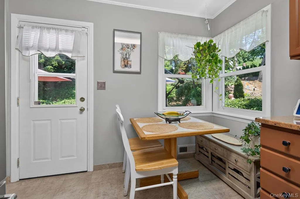 eat-in kitchen with door to patio eat-in kitchen with door to patio