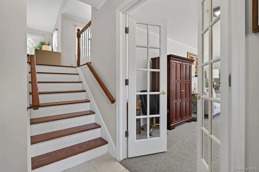 family room with french doors from entry hall family room with french doors from entry hall
