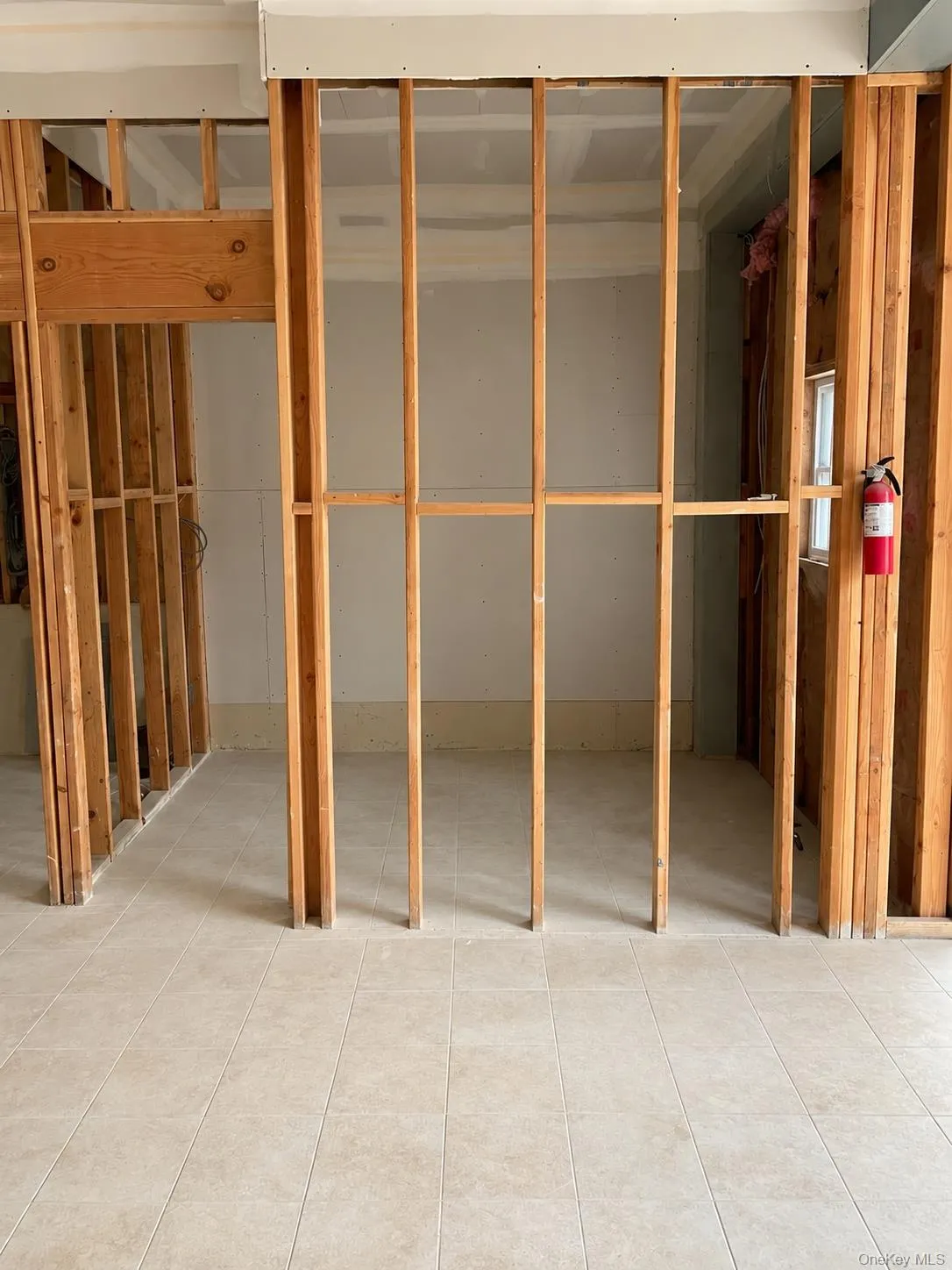 Interior with framing and tile floor Interior with framing and tile floor