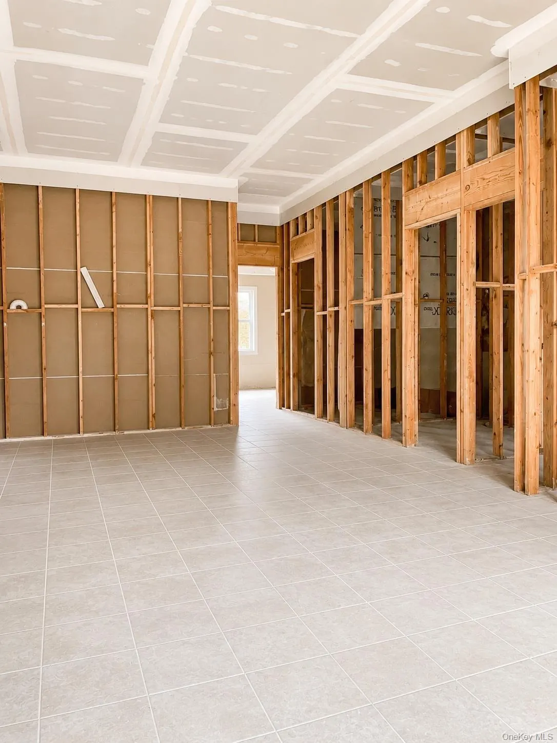 Interior with framing and tile floor Interior with framing and tile floor