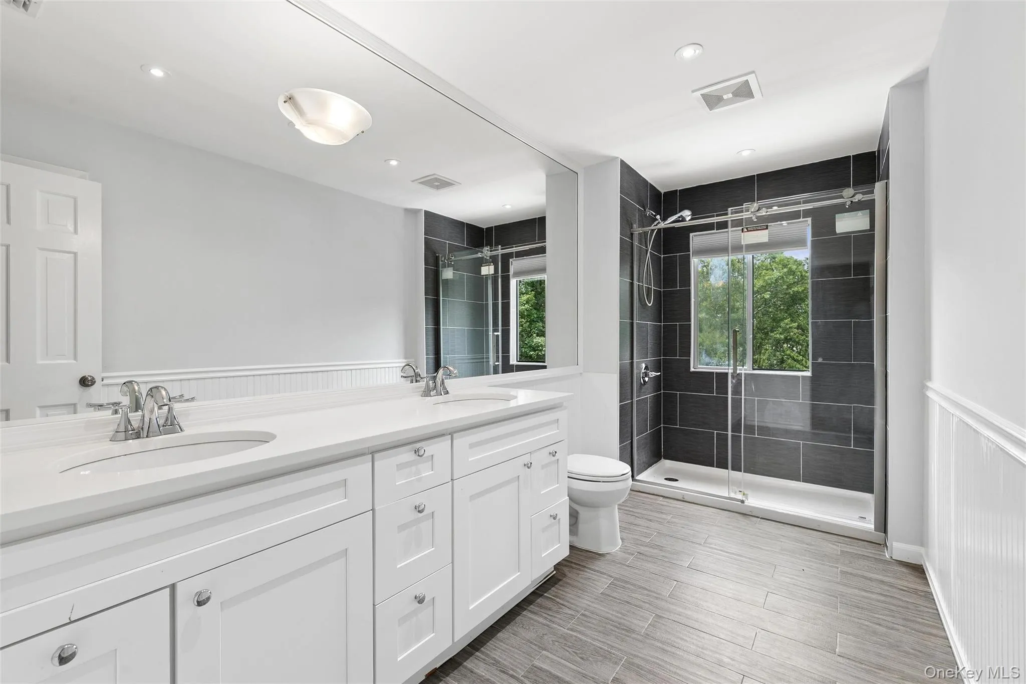 Second story full bath with dual sinks and walk in shower Second story full bath with dual sinks and walk in shower