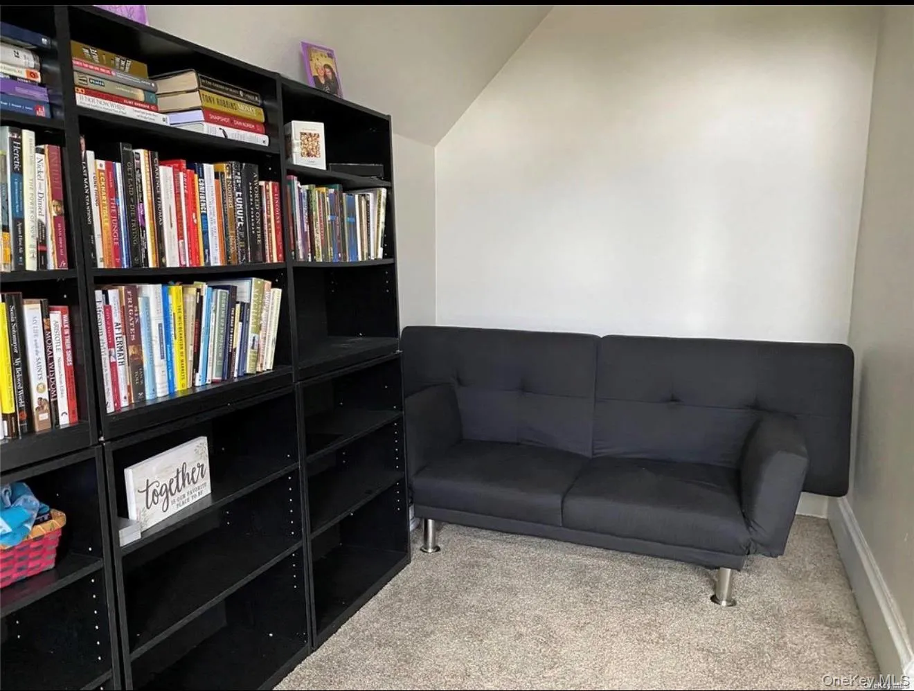 Built-in shelving units with ample storage Built-in shelving units with ample storage