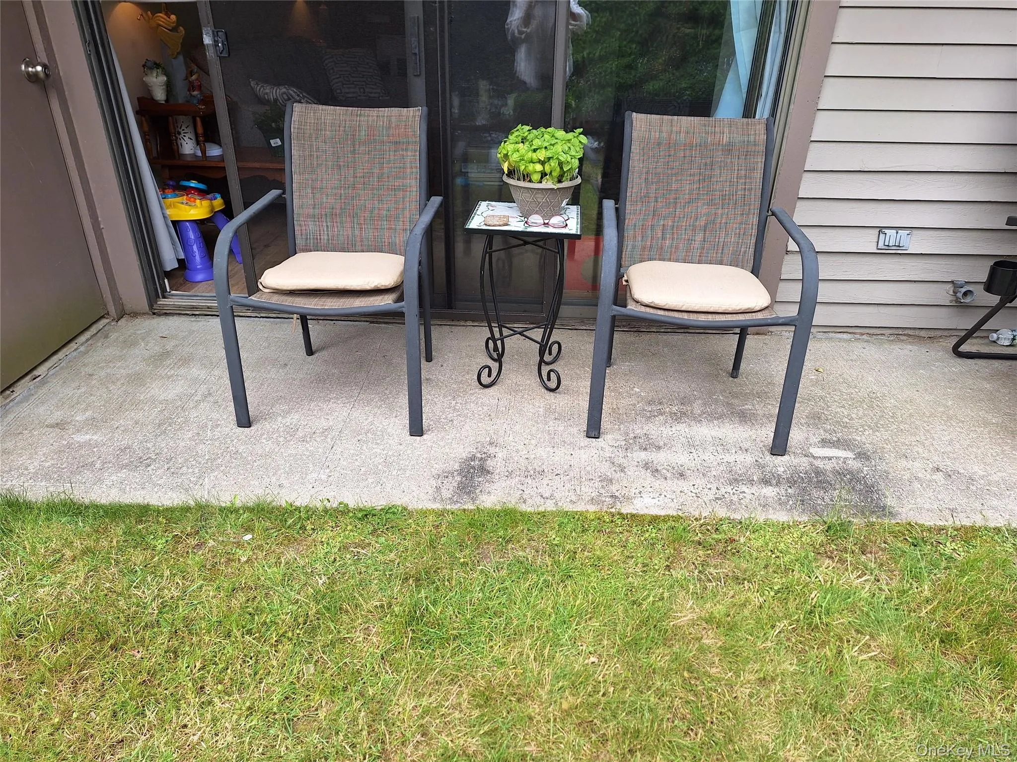 Comfy outdoor patio outside of sliding glass door Comfy outdoor patio outside of sliding glass door