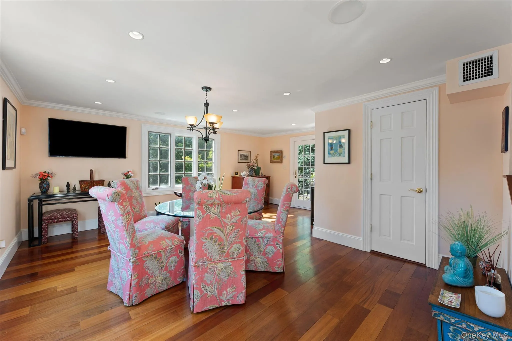 Breakfast area with powder room and access to side patio Breakfast area with powder room and access to side patio
