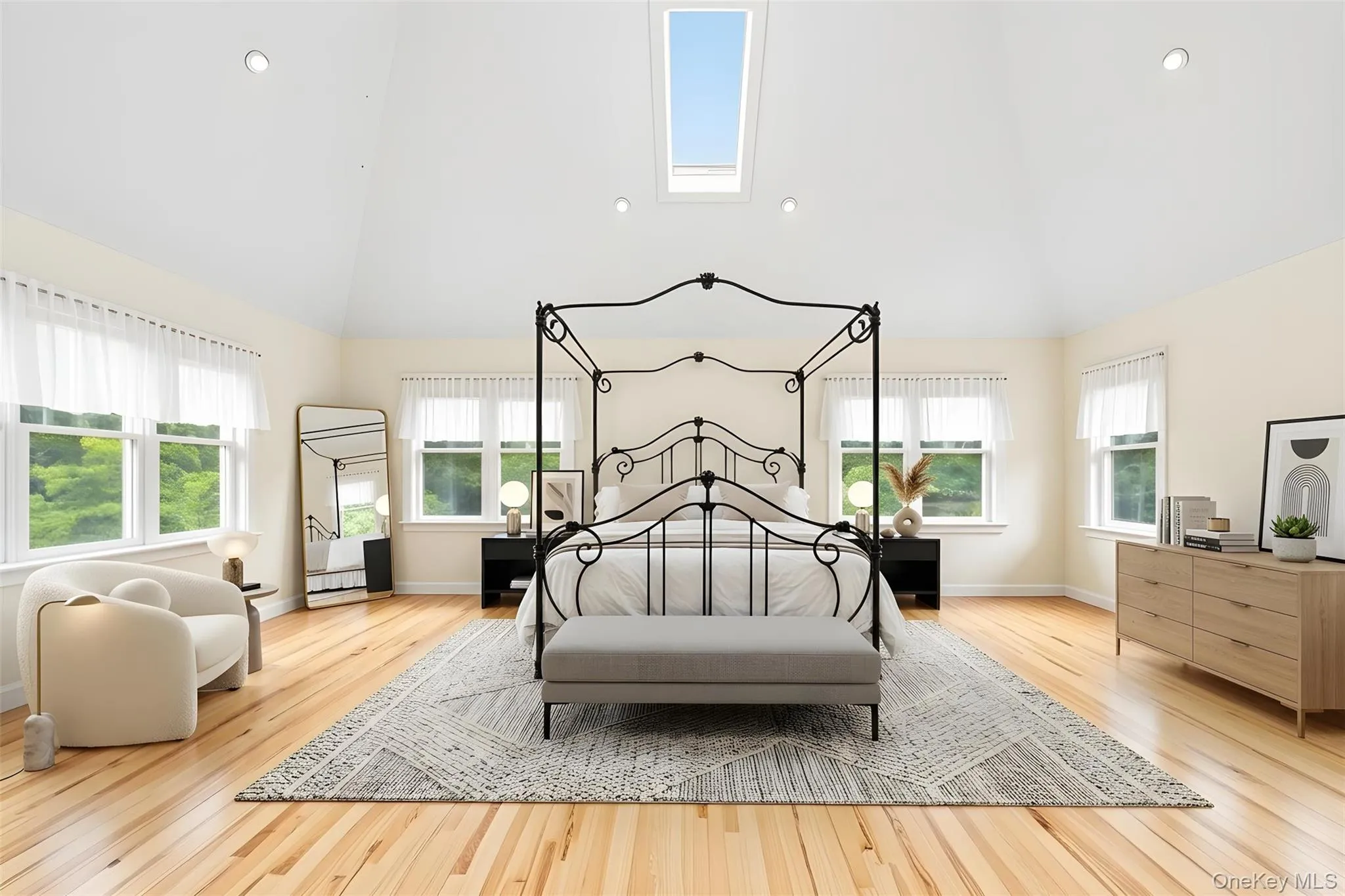 Spacious and private primary bedroom with soaring ceilings. Spacious and private primary bedroom with soaring ceilings.
