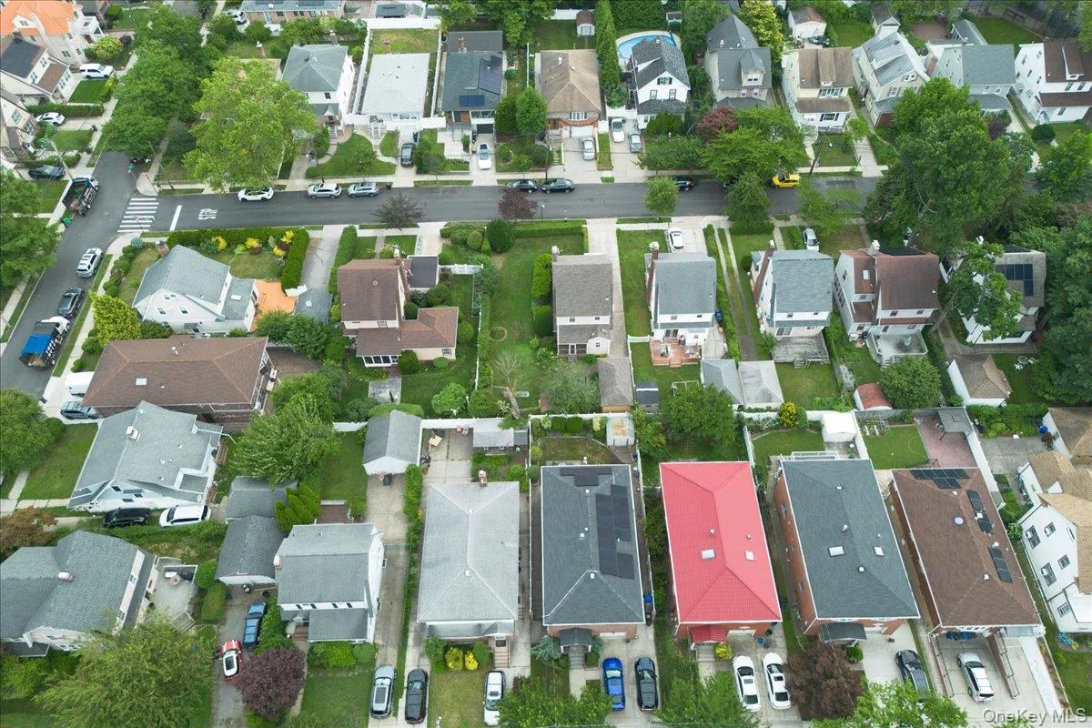 Aerial perspective showcasing a residential neighborhood with a consistent street grid Aerial perspective showcasing a residential neighborhood with a consistent street grid