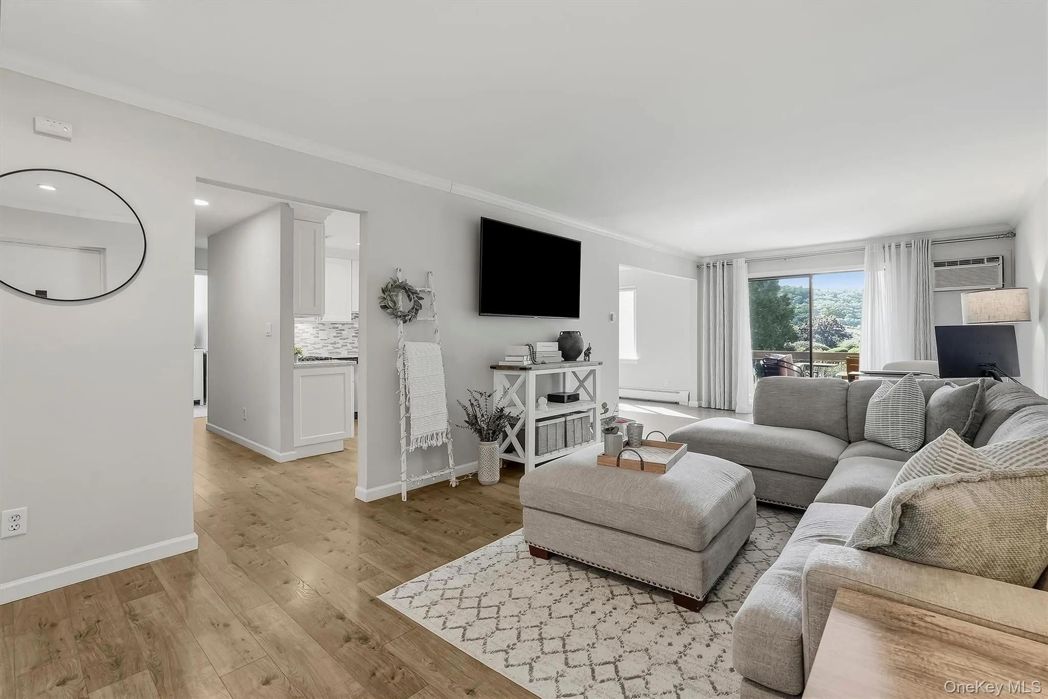 Living Room with slider to your own deck. Living Room with slider to your own deck.