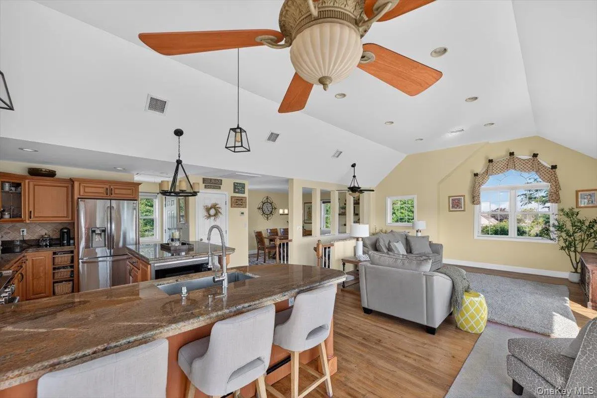 shows open layout; living room and dining room shows open layout; living room and dining room