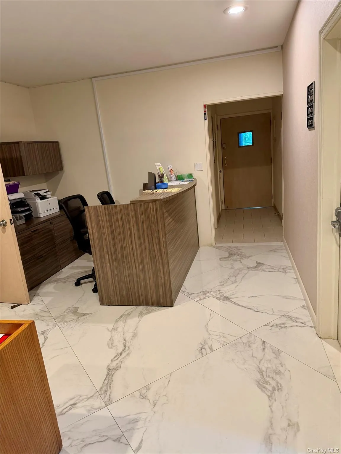 Welcoming lobby with marble floors. Welcoming lobby with marble floors.