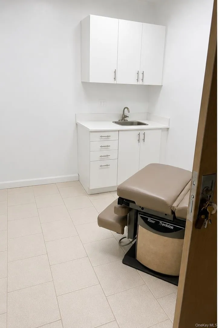 Exam room with sink. Exam room with sink.