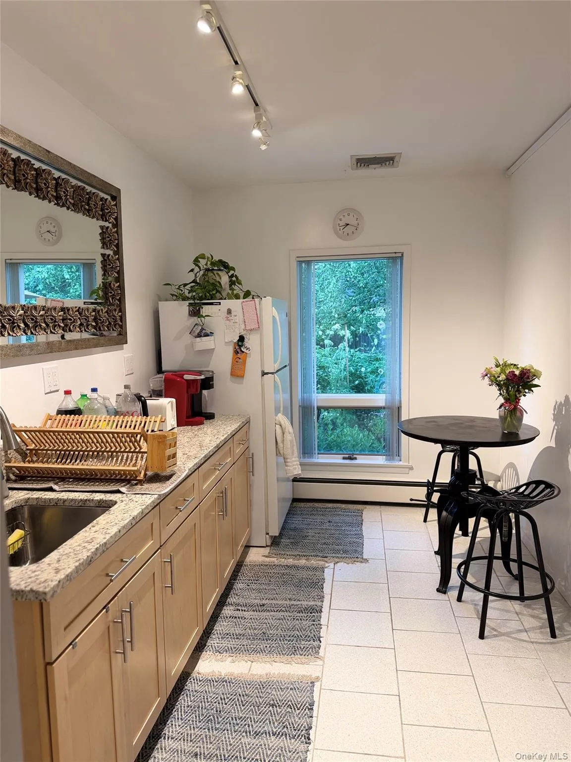 Renovated shared kitchen with fridge, microwave, toaster and counter top toaster oven. Renovated shared kitchen with fridge, microwave, toaster and counter top toaster oven.