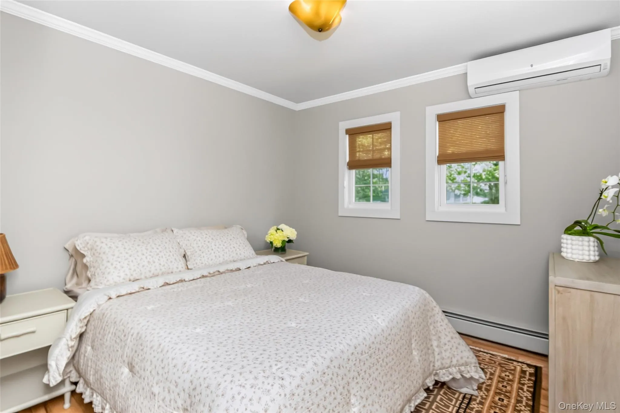 A serene, sun-filled bedroom that feels like a boutique-hotel escape. A serene, sun-filled bedroom that feels like a boutique-hotel escape.