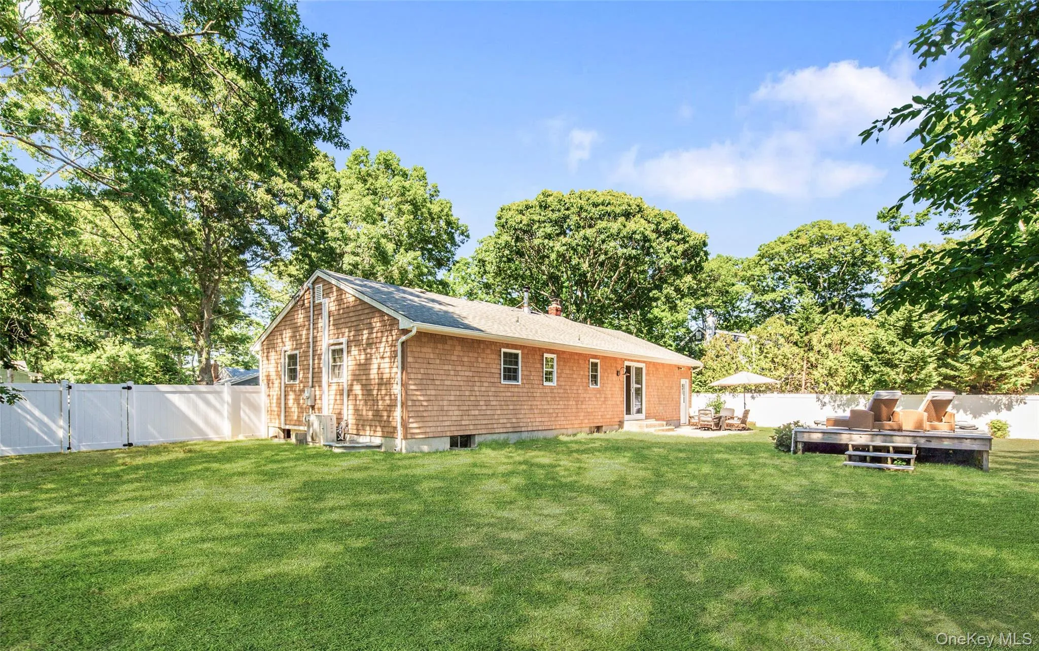 A private, fully fenced backyard oasis with room to play, entertain, and dream. A private, fully fenced backyard oasis with room to play, entertain, and dream.