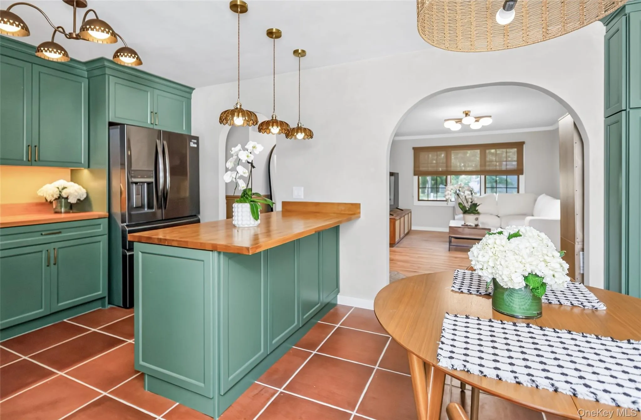 An open, easy flow from island to living room makes entertaining effortless. An open, easy flow from island to living room makes entertaining effortless.