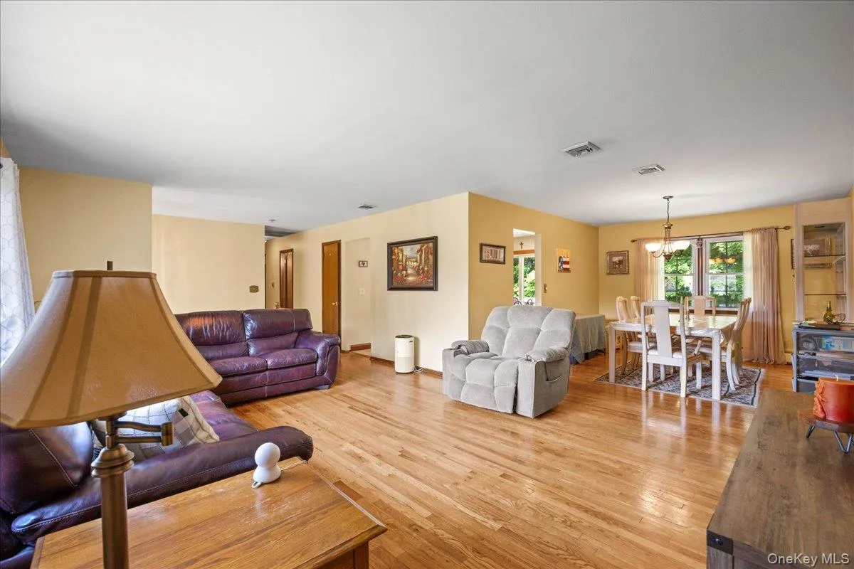 The living room flows seamlessly into the dining area. The living room flows seamlessly into the dining area.