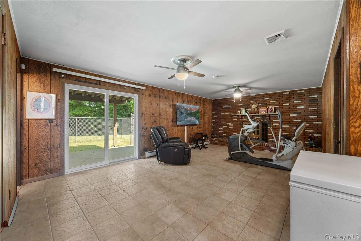 Lower level living space provides a great place to entertain as well as an area for recreational activities. Lower level living space provides a great place to entertain as well as an area for recreational activities.