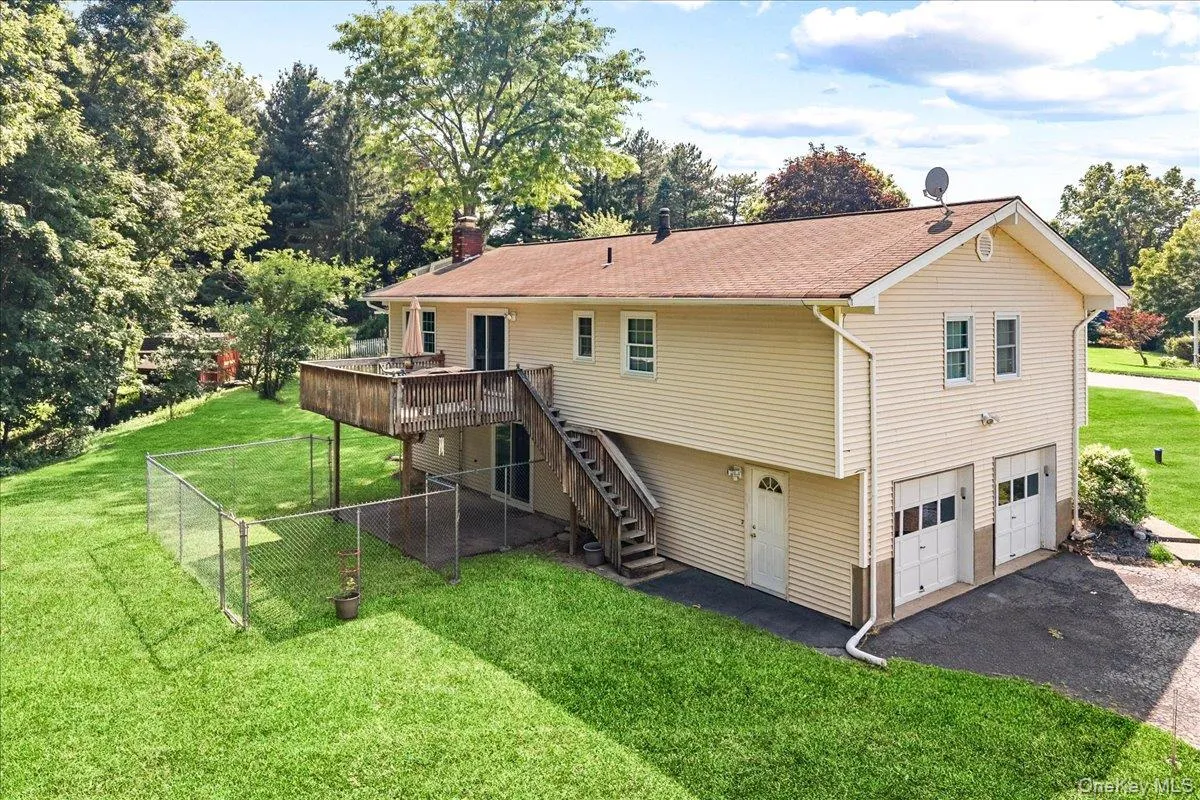 Walk-out access to the rear yard from both the home and garage. Walk-out access to the rear yard from both the home and garage.