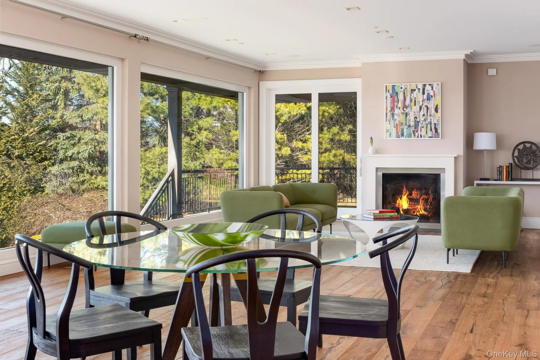 Open floor plan with dining area off large living room features gas fireplace. Open floor plan with dining area off large living room features gas fireplace.