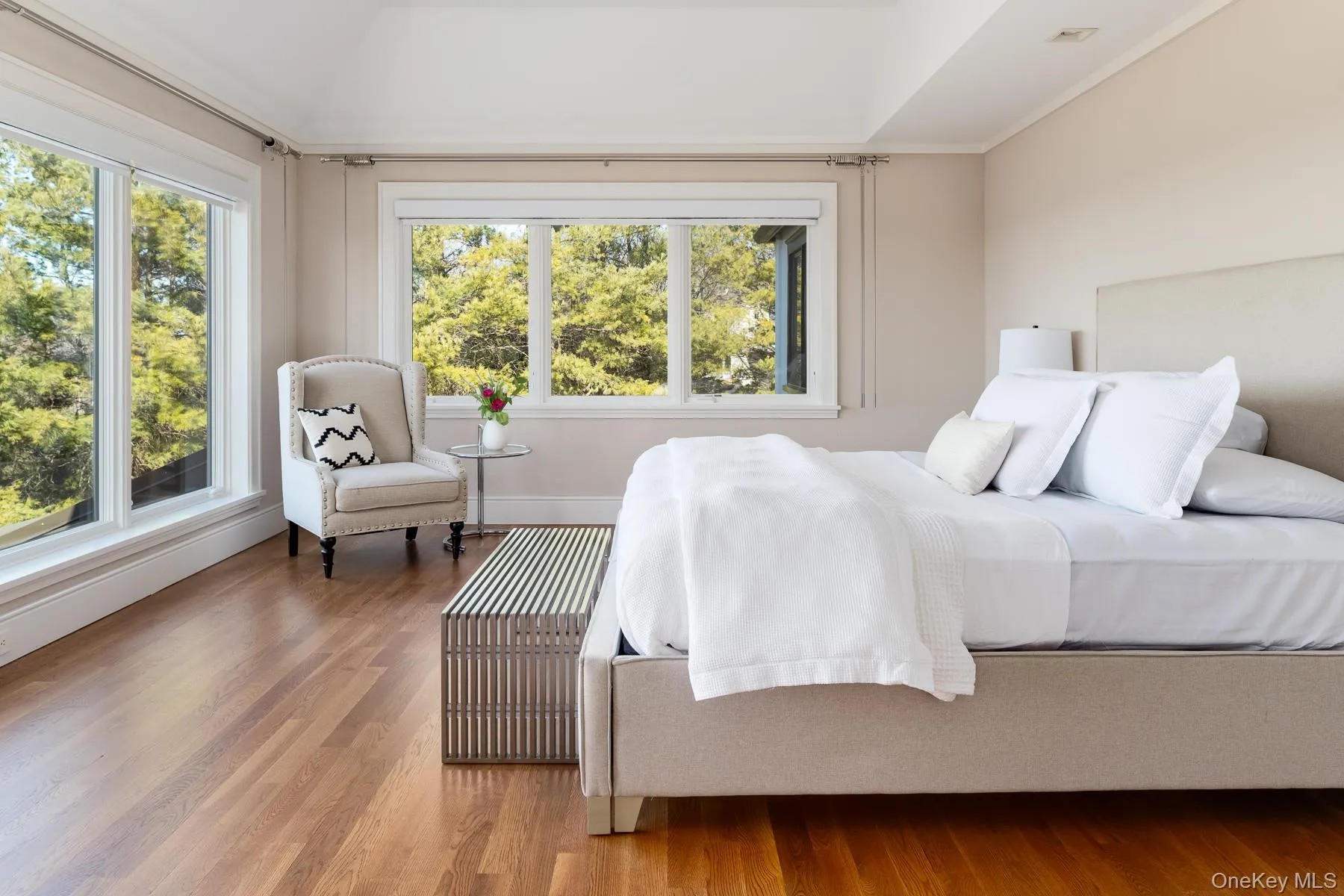 Peaceful primary bedroom - a private sanctuary. Peaceful primary bedroom - a private sanctuary.